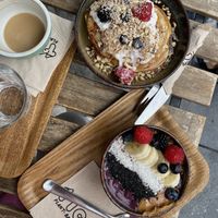 Fruity pancakes and acai bowl  at TICH Healthy Living in Brussels