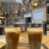 Iced latte with homemade almond milk  at TICH Healthy Living in Brussels