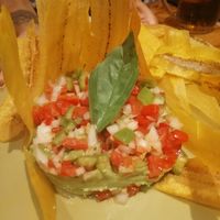 Guacamole y pico de gallo. at Pizza Basta Restaurante in Cambrils