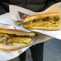 Sandwich with cecina (chickpea pancake), marinated mushrooms and aubergine  at Il Montino in Pisa