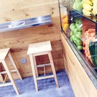 Inside bar seating and there is also a bench outside for customers too at Vertus in Paris