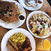 Pancakes, french toast, tofu eggs, tempeh bacon, hash with veggies and cheeze. at Vertical Diner in Salt Lake City