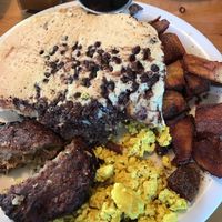 This was the Avalanche. Chocolate chip pancakes, tofu scramble, sausage patty, and hash browns. Divine. at Vertical Diner in Salt Lake City