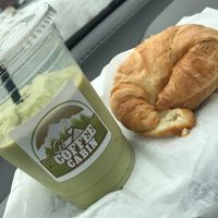 Matcha smoothie with your choice of plant milk and a plain croissant  at Coffee Cabin in Schererville