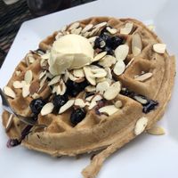 Blueberry and Almond waffle, vegan syrup in the back at The Buzz Coffee & Cafe in Burnsville