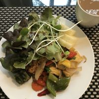 Breakfast buffet: fried rice, tofu and veggies, salad, pineapple, coffee...  at Moreganic Restaurant at Away Chiang Mai Thapae Vegan Retreat in Chiang Mai
