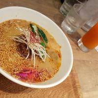 Gold sesame ramen with vege drink. at T's Tantan - Ecute Ueno in Tokyo