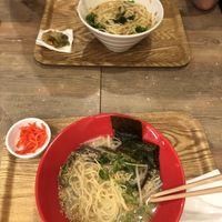 Gold-sesame tantan (top) veggie-tonkotsu ramen (bottom) - both already mixed up at T's Tantan - Ecute Ueno in Tokyo
