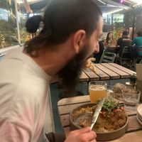 Matt eating his second cauliflower head  at Yonder in Queenstown