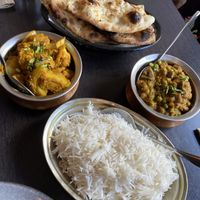 Garlic naan, the cauliflower dish and the mushroom, peas dish  at Sagun Cafe in Wanaka