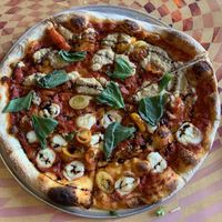 Caprise pizza with half house-made vegan mozzarella and half cashew ricotta…both were excellent!   at City O' City in Denver