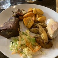 Seitan marinato e stufato con porri e carote, zucca al timo e patate al rosmarino e paprika   at L'Orto Bistrot in Turin