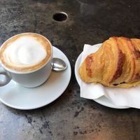Soy cappuccino and croissant at L'Orto Bistrot in Turin