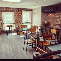 Second floor seating. There is three upstairs rooms. This is called the loft and the family friendly room is called Riverside. High chairs are available on all floors and restaurants. Rooms are available to rent out for large parties or events.  at The Bodacious Family of Shops in Janesville