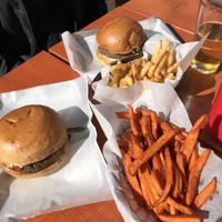 Vegan lentil burgers with sweet potato fries & tagine fries at The Burger Stand at Taos Ale House in Santa Fe