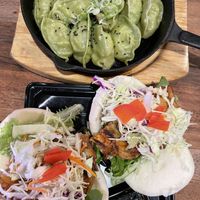 Edamame & mushroom steamed dumplings, tempura veg bao   at Little High Eatery in Christchurch