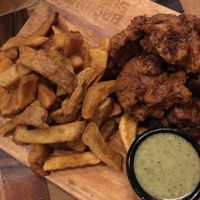 Hand cut fries, vegan aioli and deep fried cauliflower  at Little High Eatery in Christchurch