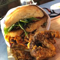 'Sweet Sweet Clo' vegan burger and deep fried cauliflower side. at Little High Eatery in Christchurch