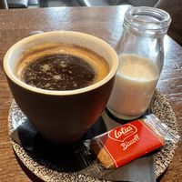 Americano with oat milk on the side  at Roos Leap in Montrose