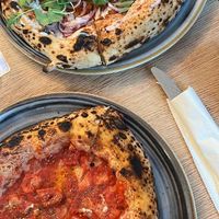 Pizza Marinara di Vegazzi and Pizza Ungherese at Vegazzi Specialty Pizzeria in Budapest