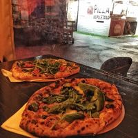 Pizza Verde and Pizza Funghi  at Vegazzi Specialty Pizzeria in Budapest