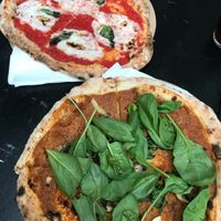 margarita and mushroom pesto pizzas at Vegazzi Specialty Pizzeria in Budapest