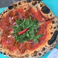 Sausage, red onion and chilli pizza  at Vegazzi Specialty Pizzeria in Budapest