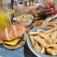 Can’t remember what’s this burger but it’s one of 10 vegan burgers they offer on the menu. Also, onion rings! at Hans im Glück in Central Singapore