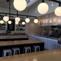 Counter service, four types of seating options. Here is the communal bar seating  at Honest Mary's in Austin