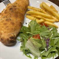 Calzone  vegan pepperoni cheese   at Slices in Osaka