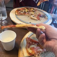 cracker crust - we thought they were store bought crusts but did catch a glimpse of them being made by handd  at Slices in Osaka