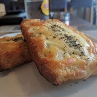 Crispy with more salty herb flavor than garlic- but very good! at Slices in Osaka