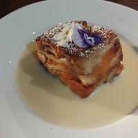 Apricot bread and butter pudding and custard. at The Brit in Port Talbot