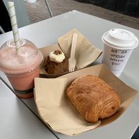 Carrot cake, smoothie and pain au chocolate  at East Village Cafe in Bristol