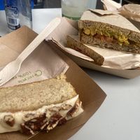 Chick pea sandwich and cake  at East Village Cafe in Bristol