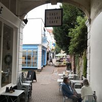 Seating in the archway at East Village Cafe in Bristol