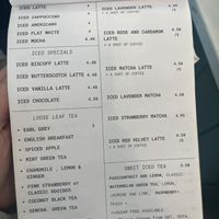 Menu items: lattes and tea  at East Village Cafe in Bristol