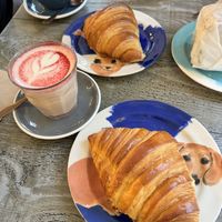 Croissant and cardamom lattee  at East Village Cafe in Bristol