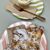 Almond croissant and lemon-poppyseed cupcake   at East Village Cafe in Bristol