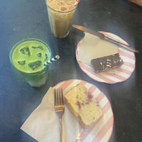 Iced Matcha Latte (left) , Biscoff Latte (top),  Pecan Chcolate Shortbread (right) & Lemon Raspberry Drizzle (bottom)  at East Village Cafe in Bristol