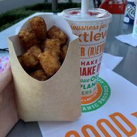 Tots and a strawberry shake! 🍓 at Next Level Burger - Concord in Concord