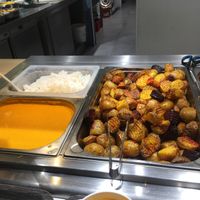 Rice potatoes flan veg and creamy pumpkin soup which was delicious  at Loving Hut - Spalena in Prague