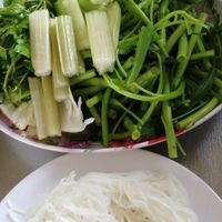 You will get these with hot pot. Cook green vegetables in the pot, eat the rice noodle separately with the staff you cooked in hot pot in the small bowl you will get. at Tinh Tam Trai in Phu Quoc
