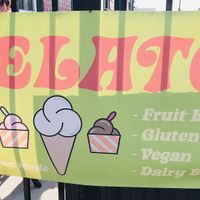 Outdoor sign showing vegan option available  at The Bean Counter Cafe in Picton