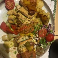 Tofu, potatoes and veggies, polenta, red sauce   at Klopa in Sarajevo