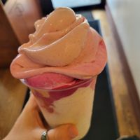 Raw rainbow banana whip has mango, strawberry and dragonfruit at Happy Zoe Vegan Bakery in Brooklyn