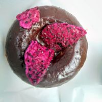 Dragon fruit and chocolate donut at Happy Zoe Vegan Bakery in Brooklyn