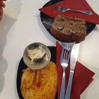 Banana bread and pepperoni calzone with mayo at Hillgate Cakery in Stockport