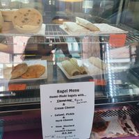 Selection of savoury goods. Pie, burrito, calzone and sausage roll at Hillgate Cakery in Stockport