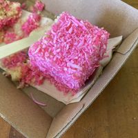 Pink vegan lamington  at Lucky Cat Cafe in Annerley